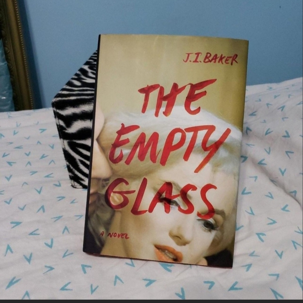 The Empty Glass Author: J. I. Baker